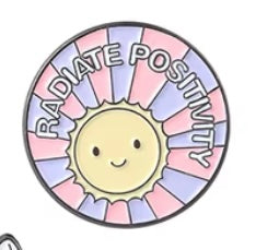 Radiate positivity pin badge