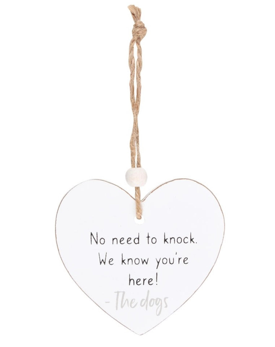 The Dogs Already Know You Are Here Hanging sign