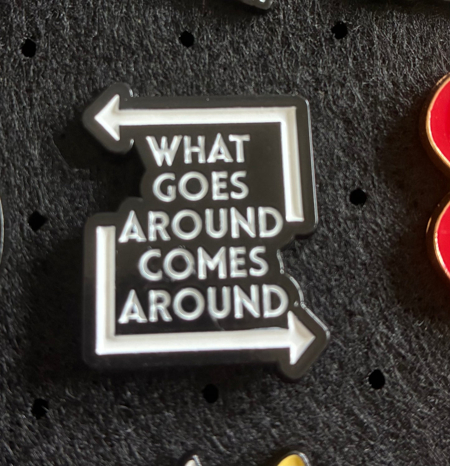 What goes around comes around pin badge