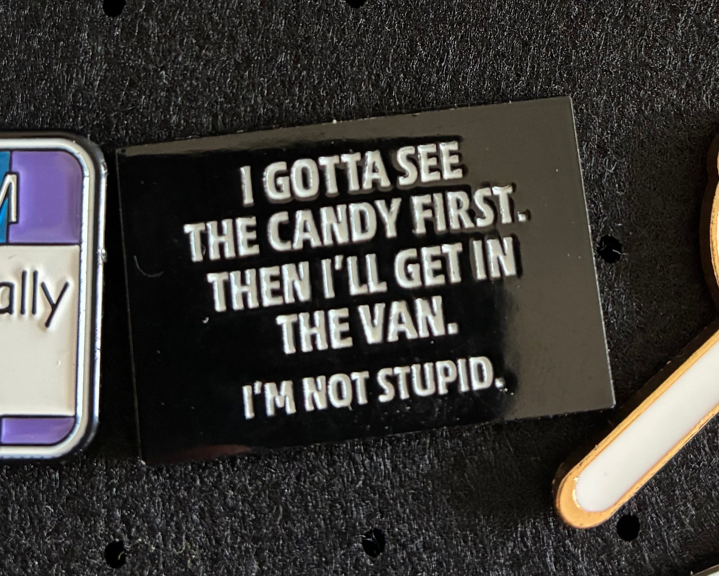 Gotta see the candy first pin badge
