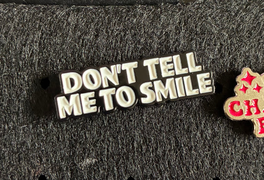 Don’t tell me to smile pin badge