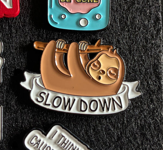 Slow down sloth pin badge