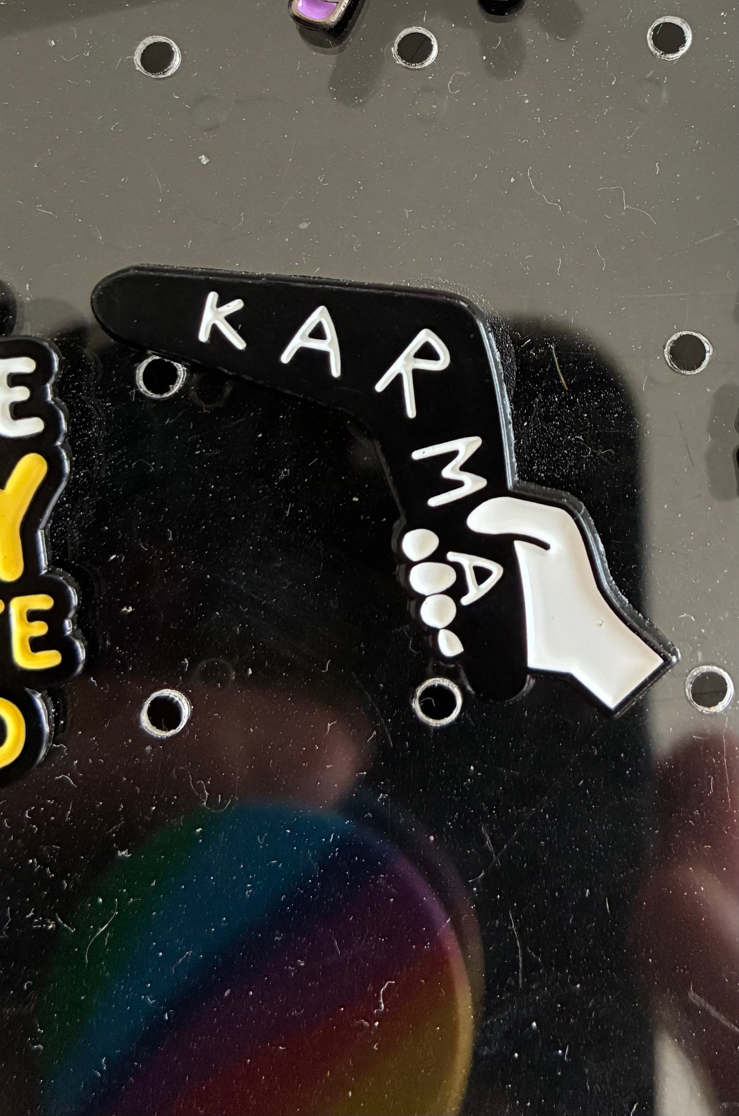 Karma boomerang pin badge