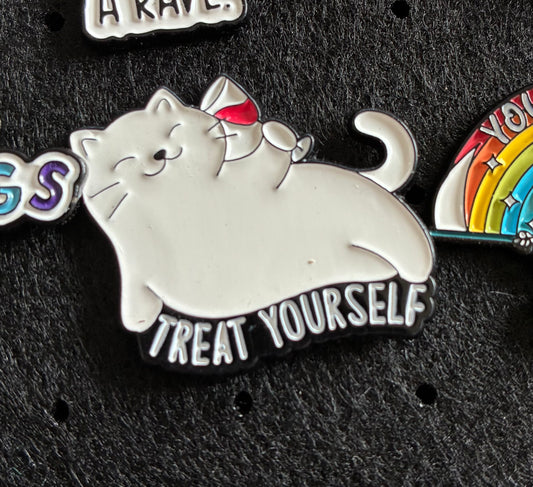 Treat yourself cat pin badge