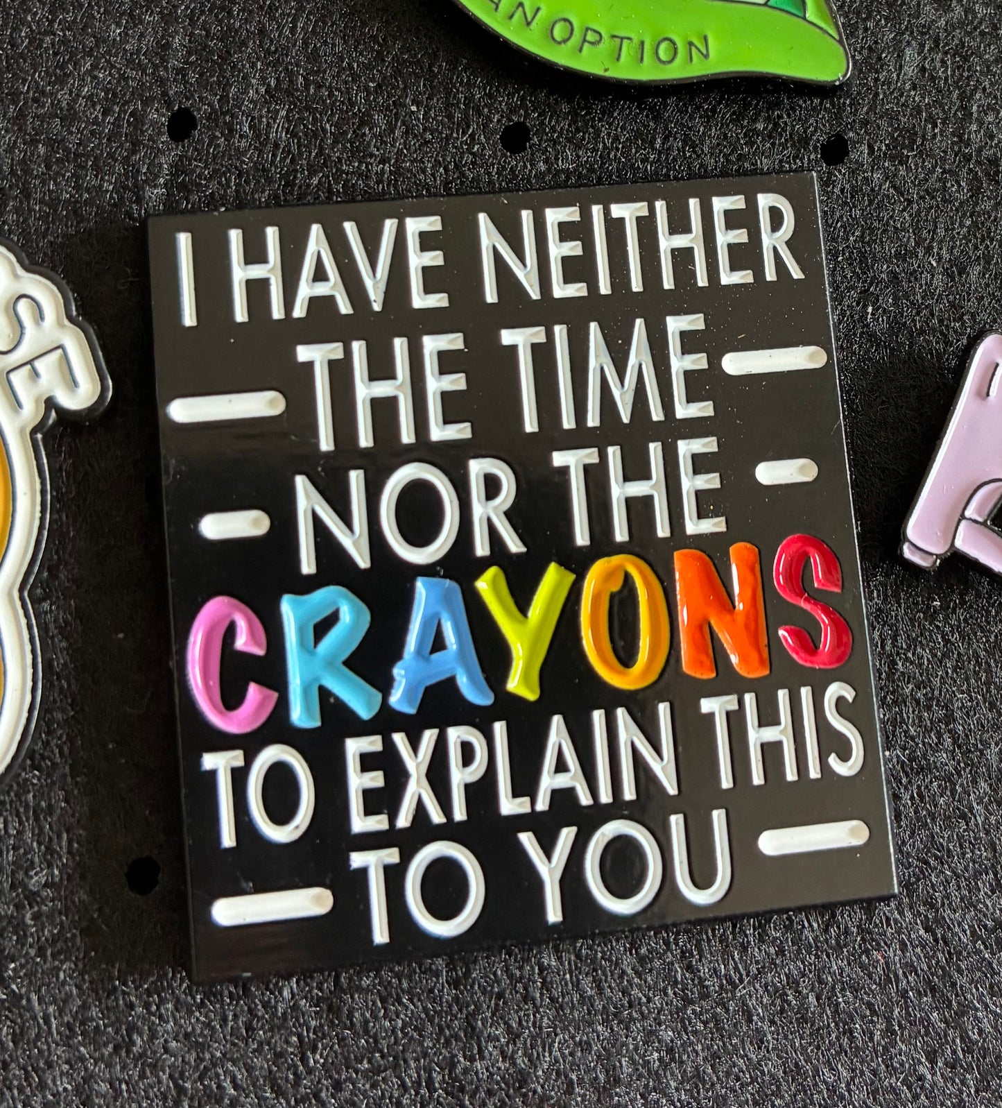 Neither the time nor the crayons pin badge
