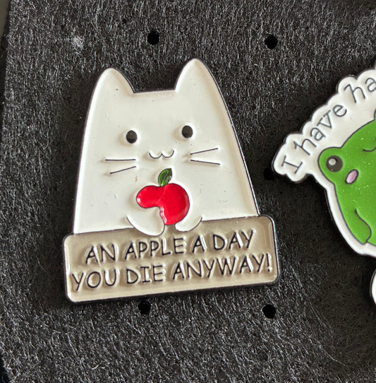 An apple a day pin badge