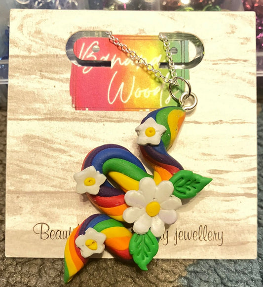 Rainbow snake with flowers- handmade polymer clay pendant necklace