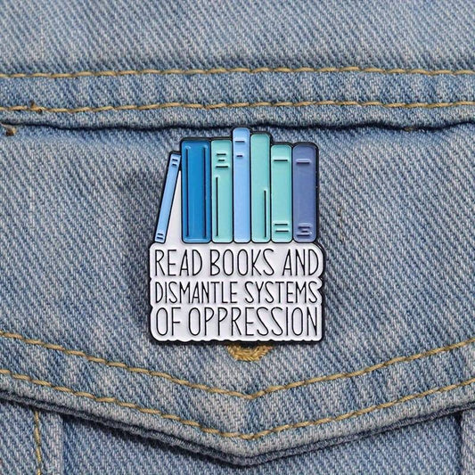 Read Books and dismantle systems of oppression pin badge